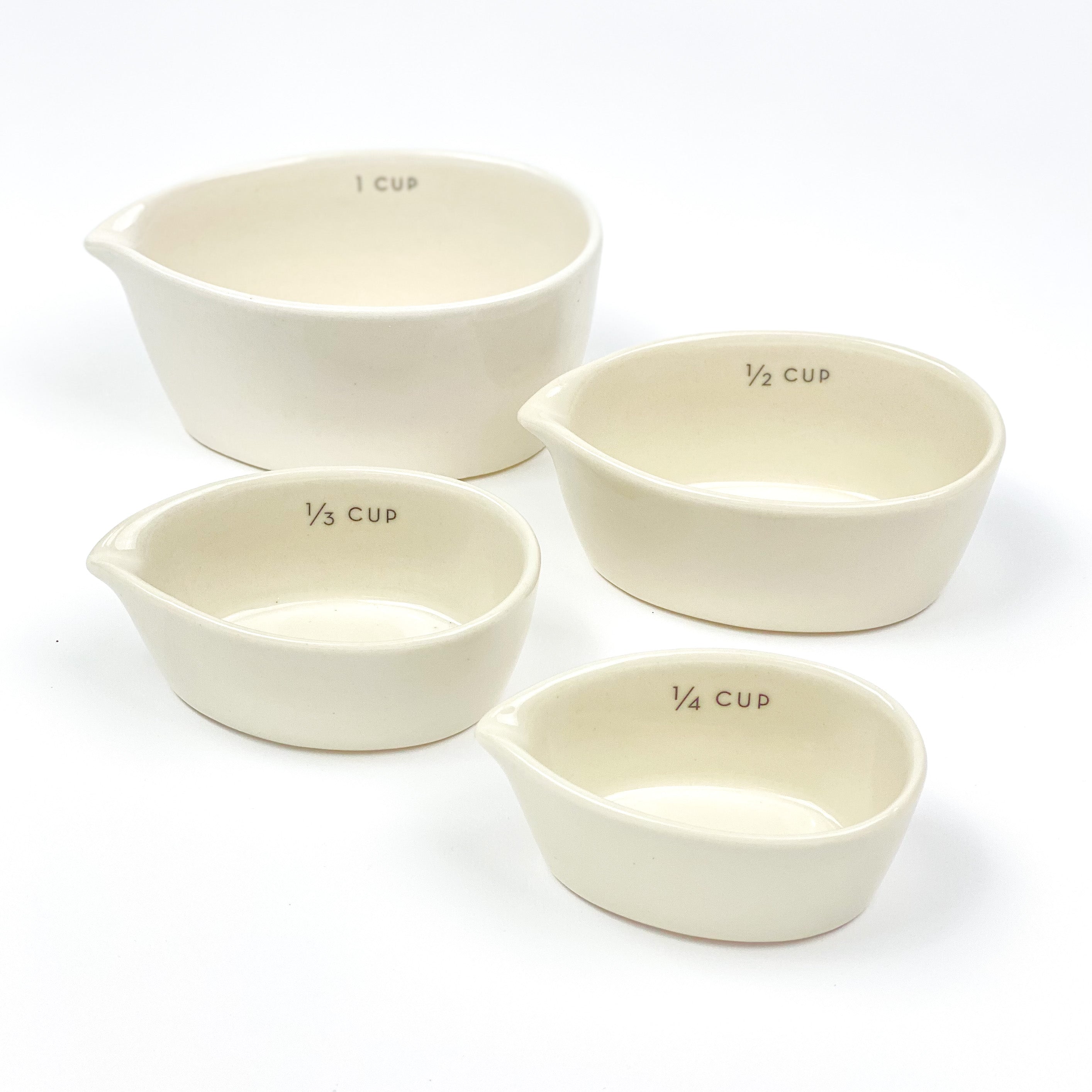 Wilton Navy & Gold Nesting Measuring Cups with Snap-On Ring, 4-Count
